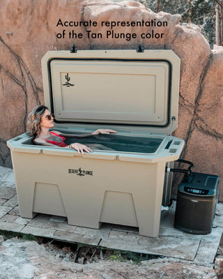 Person in the Exclusive Tan 1/4 horsepower cold plunge tub. Text states that the image displays an accurate representation of the Tan Plunge color.
