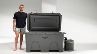 Man standing next to gray desert plunge chiller unit
