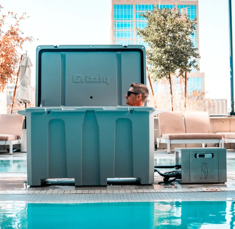 A photo of a man enjoying cold therapy in a 3/4 horsepower Desert Plunge cold plunge.