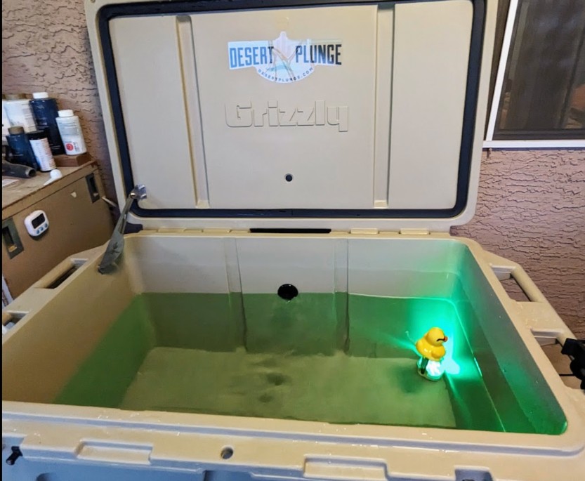 A Desert Plunge cold plunge tub with a rubber ducky.